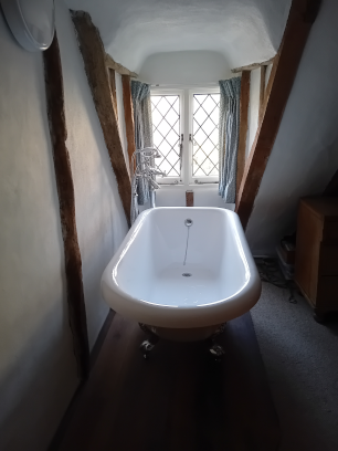 bathtub in dormer window